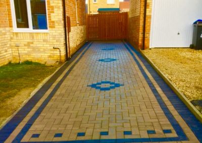 Block paving driveway with dark border edge