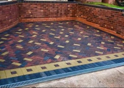 Block paving with wall