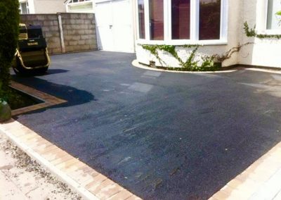 Dark Tarmac driveway with border install