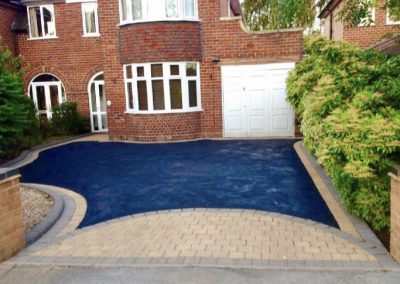 Pattern block paving edge with tarmac