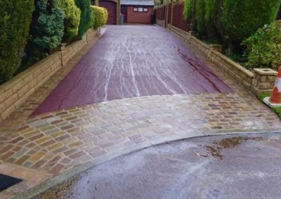 Red tarmac driveways installation